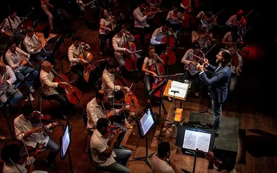 Imagem ilustrativa da imagem OSBA realiza concerto em homenagem a Belchior no Rio Vermelho